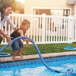 mother and child cleaning their pool